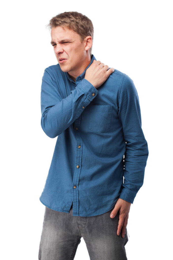 A man experiencing neck pain with radiating discomfort down his arm, illustrating possible symptoms of cervical radiculopathy or neck nerve compression.